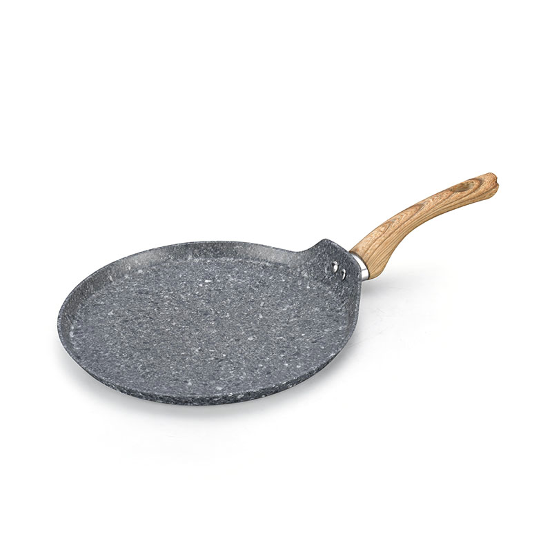 أواني الجرانيت والمقالي مروّخة من أدوات الطهي