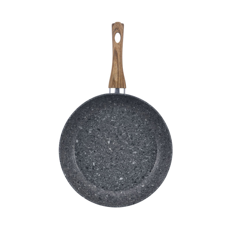 أواني الجرانيت والمقالي مروّخة من أدوات الطهي