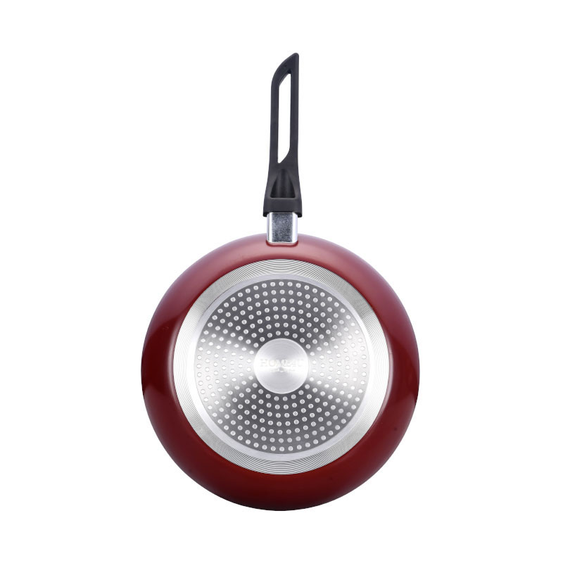 الأواني متعددة الألوان وأدوات طبخ مضغوطة