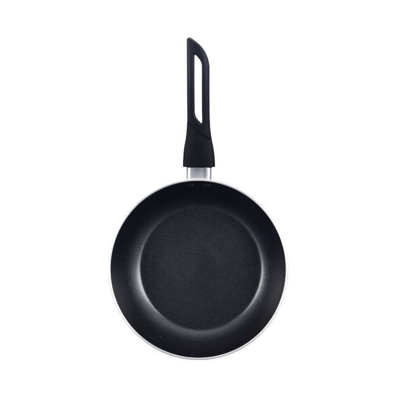 الأواني متعددة الألوان وأدوات طبخ مضغوطة