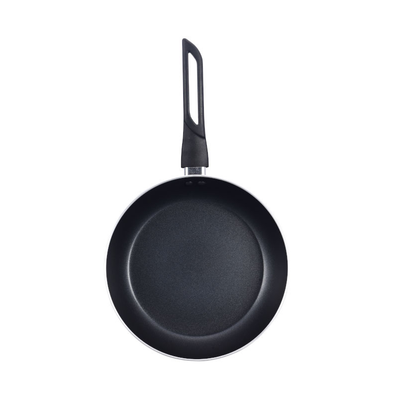 الأواني متعددة الألوان وأدوات طبخ مضغوطة