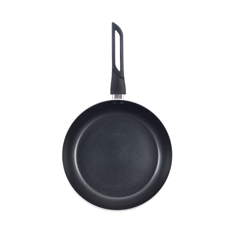 الأواني متعددة الألوان وأدوات طبخ مضغوطة