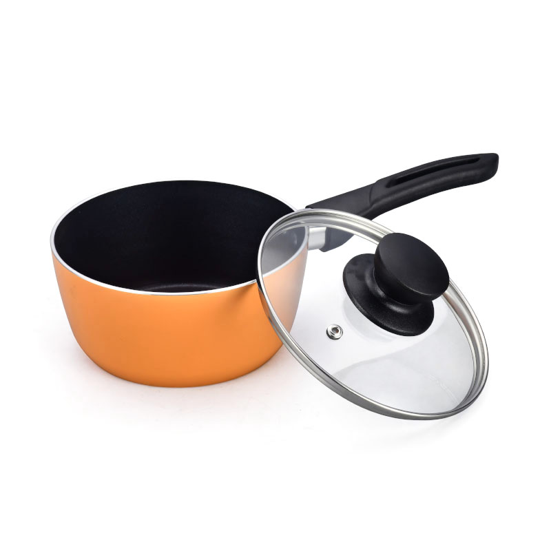 الأواني متعددة الألوان وأدوات طبخ مضغوطة