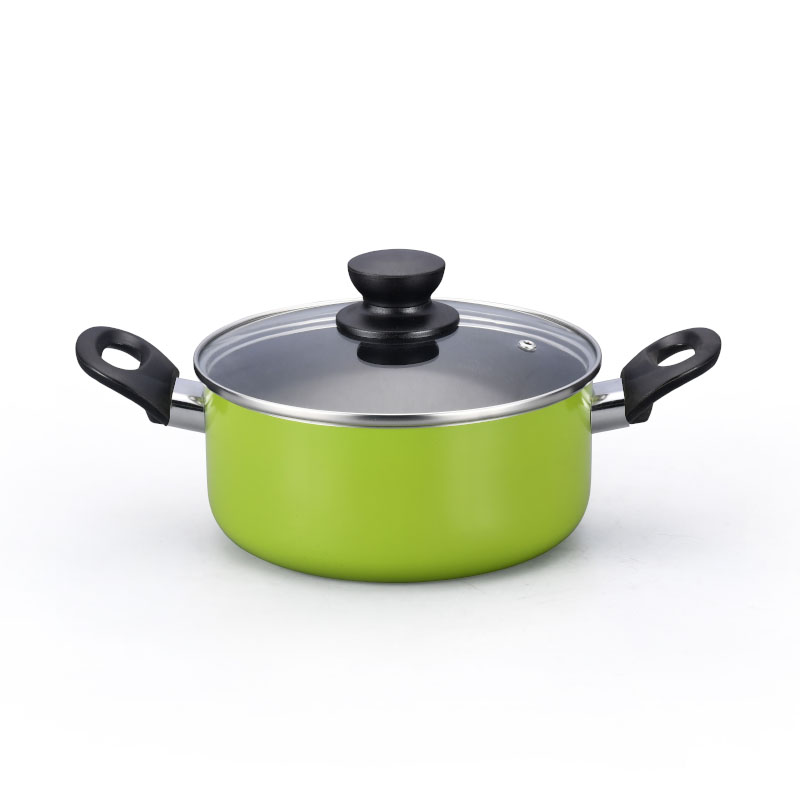 الأواني متعددة الألوان وأدوات طبخ مضغوطة