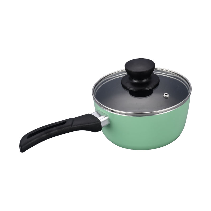 الأواني متعددة الألوان وأدوات طبخ مضغوطة