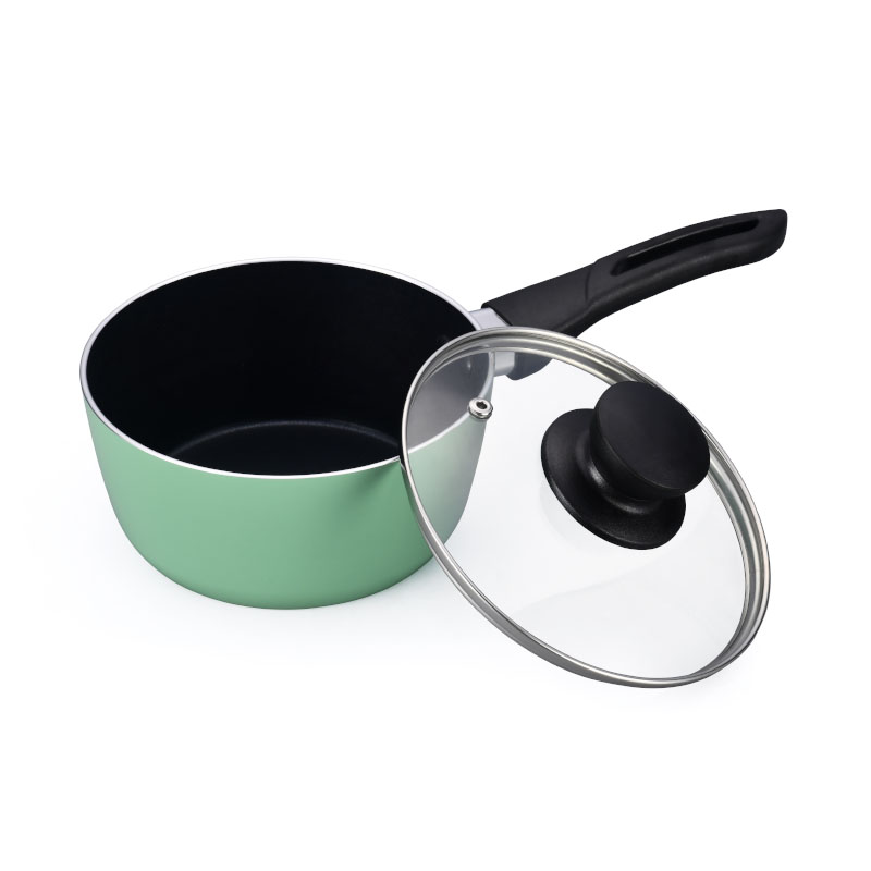 الأواني متعددة الألوان وأدوات طبخ مضغوطة